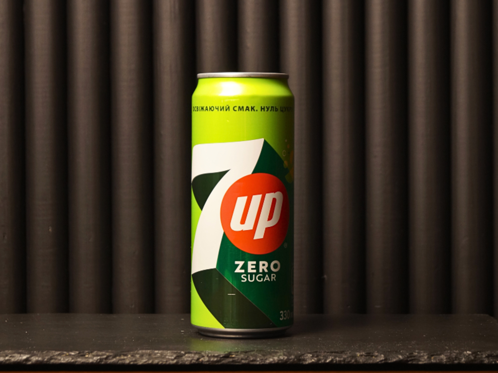 Напій "7 UP" з/б 0.33л.