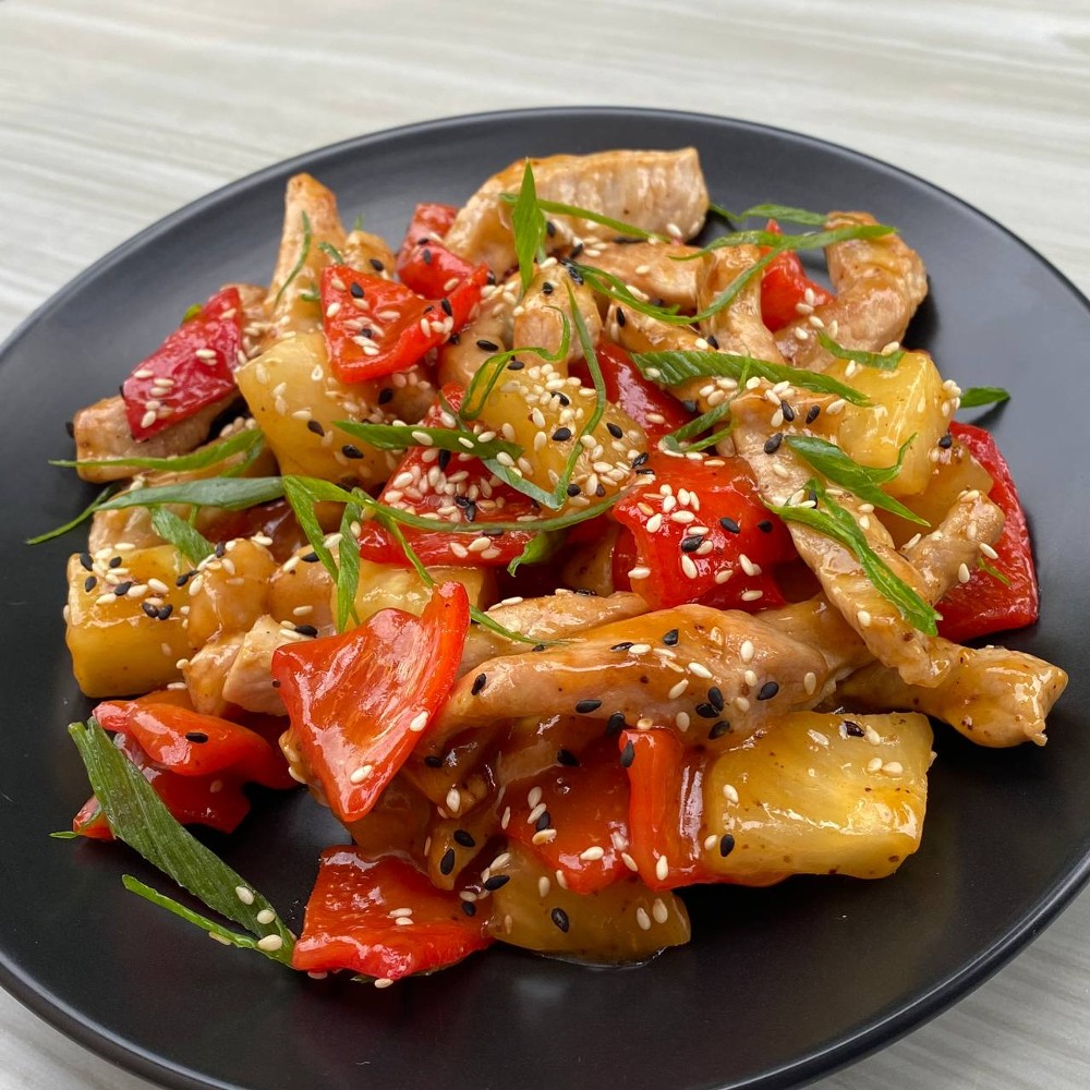 Свинина з ананасом