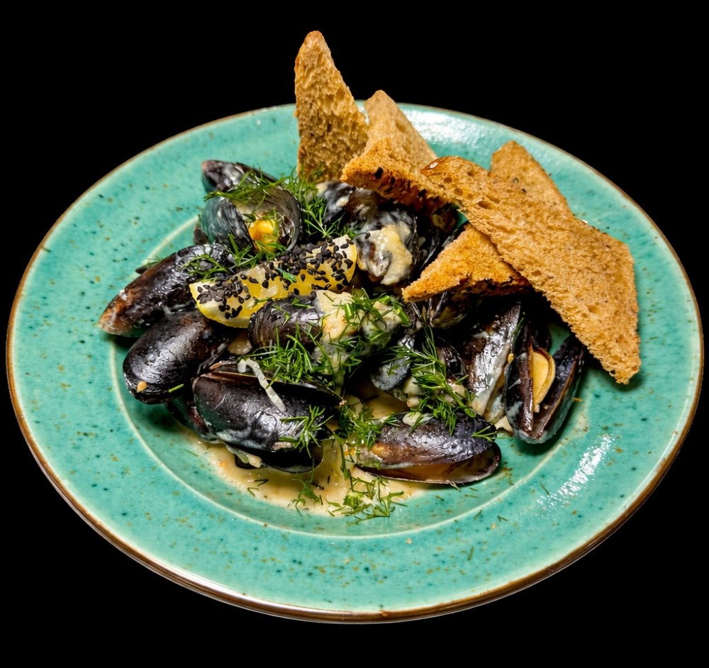 Мідії в вершковому соусі