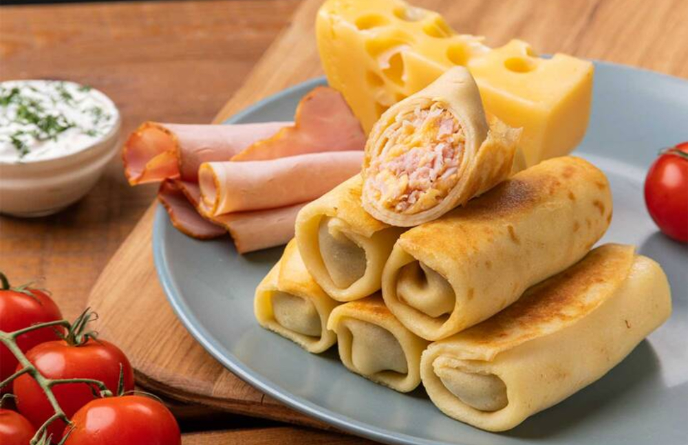 Млинці шинкою та сиром