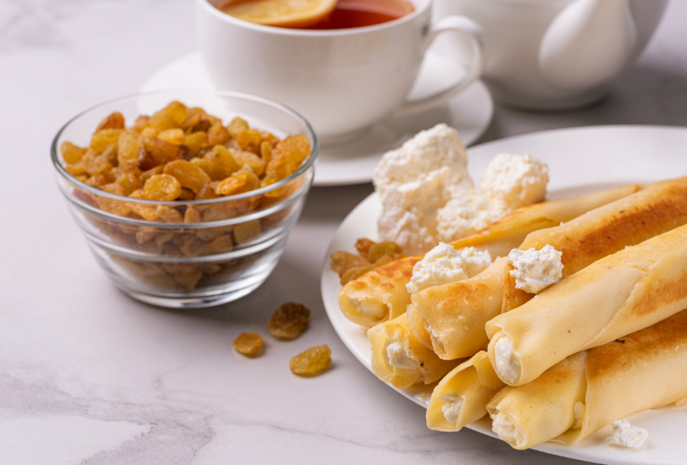 Млинці з сиром солодким та родзинками