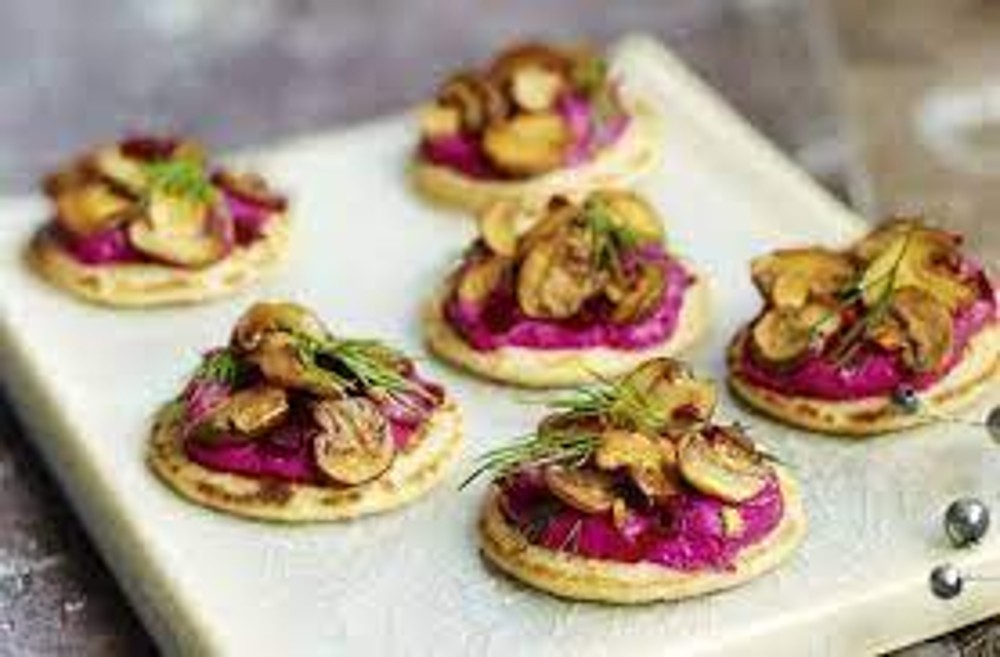 Beetroot blinis with garlicky mushrooms 