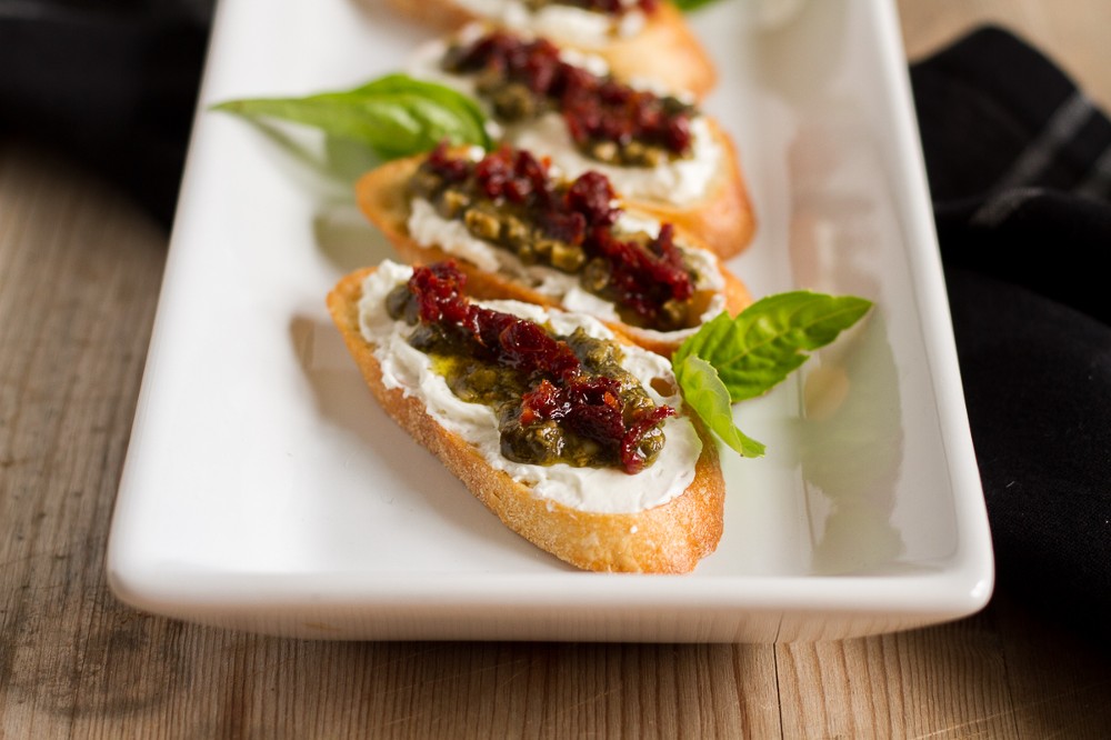 Pesto Sauce, Sun-Dried Tomatoes and Cream Cheese Crostini