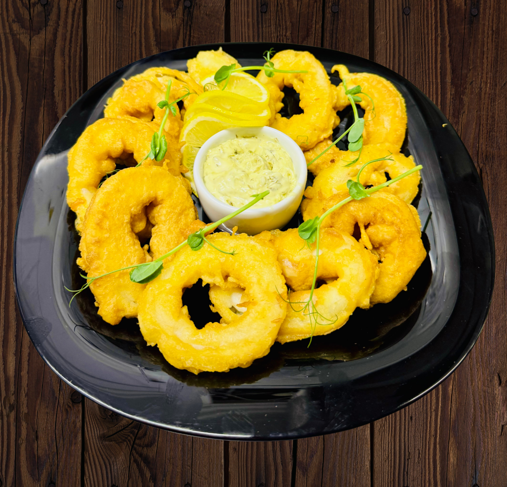 Кальмари в клярі з соусом тар-тар