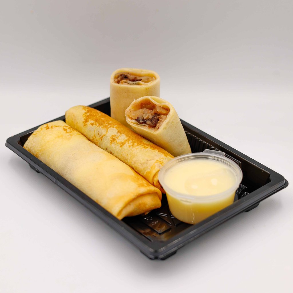 МЛИНЦІ З ЯБЛУКОМ, ЧОРНОСЛИВОМ, ГОРІХОМ ТА ВАНІЛЬНИМ СОУСОМ (ПОРЦІЯ)