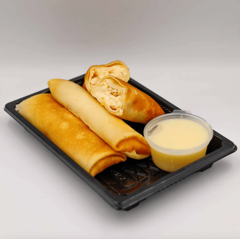 МЛИНЦІ З МАНГО, СИРОМ ТА ВАНІЛЬНИМ СОУСОМ (ПОРЦІЯ)