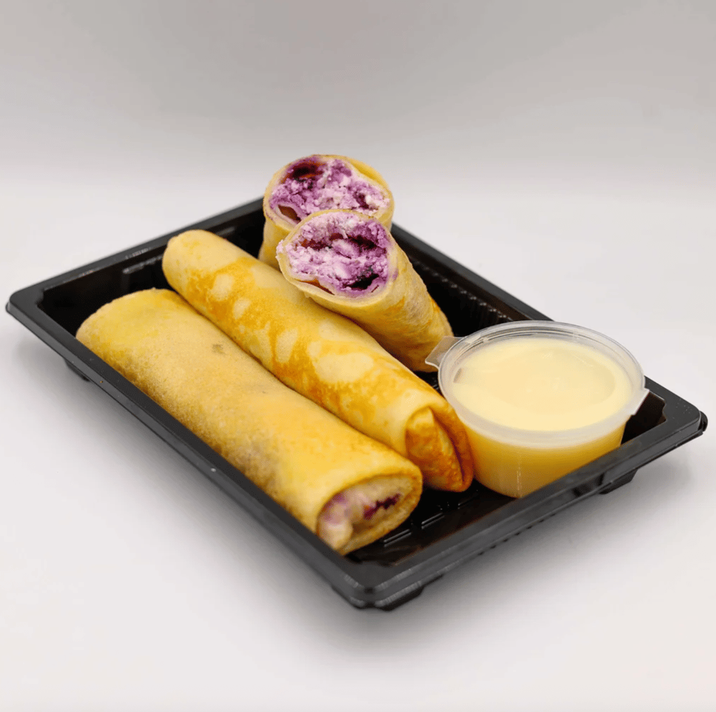 МЛИНЦІ З ЧОРНИЦЕЮ, СИРОМ ТА ВАНІЛЬНИМ СОУСОМ (ПОРЦІЯ)