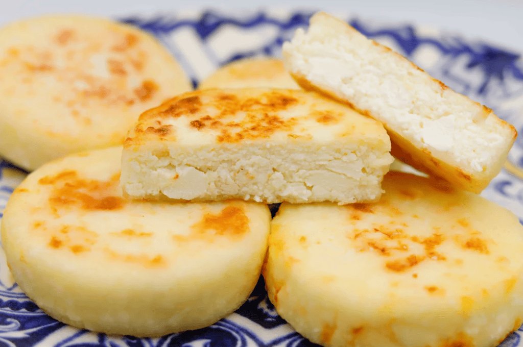 СИРНИКИ КЛАСИЧНІ СМАЖЕНІ ЗАМОРОЖЕНІ | 800 Г УПАКОВКА