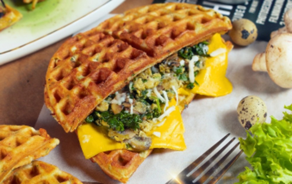 Waffle sandwich with scramble, mushrooms