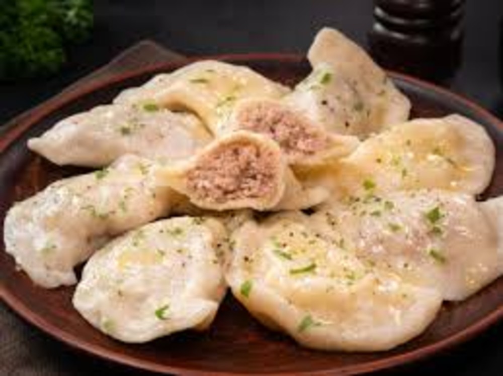  Вареники із  куркою, з вершковим маслом  150г