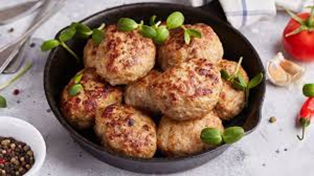 Котлета домашня із свинини та телятини   50г