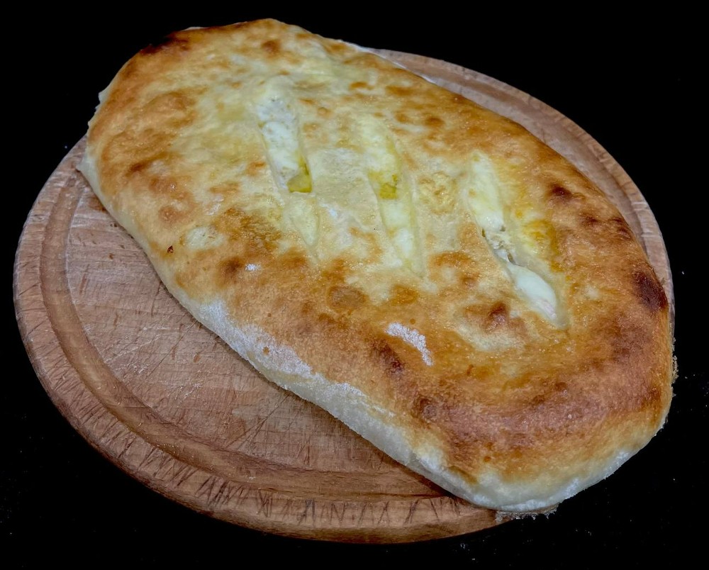 Цуца( свинина з сиром)