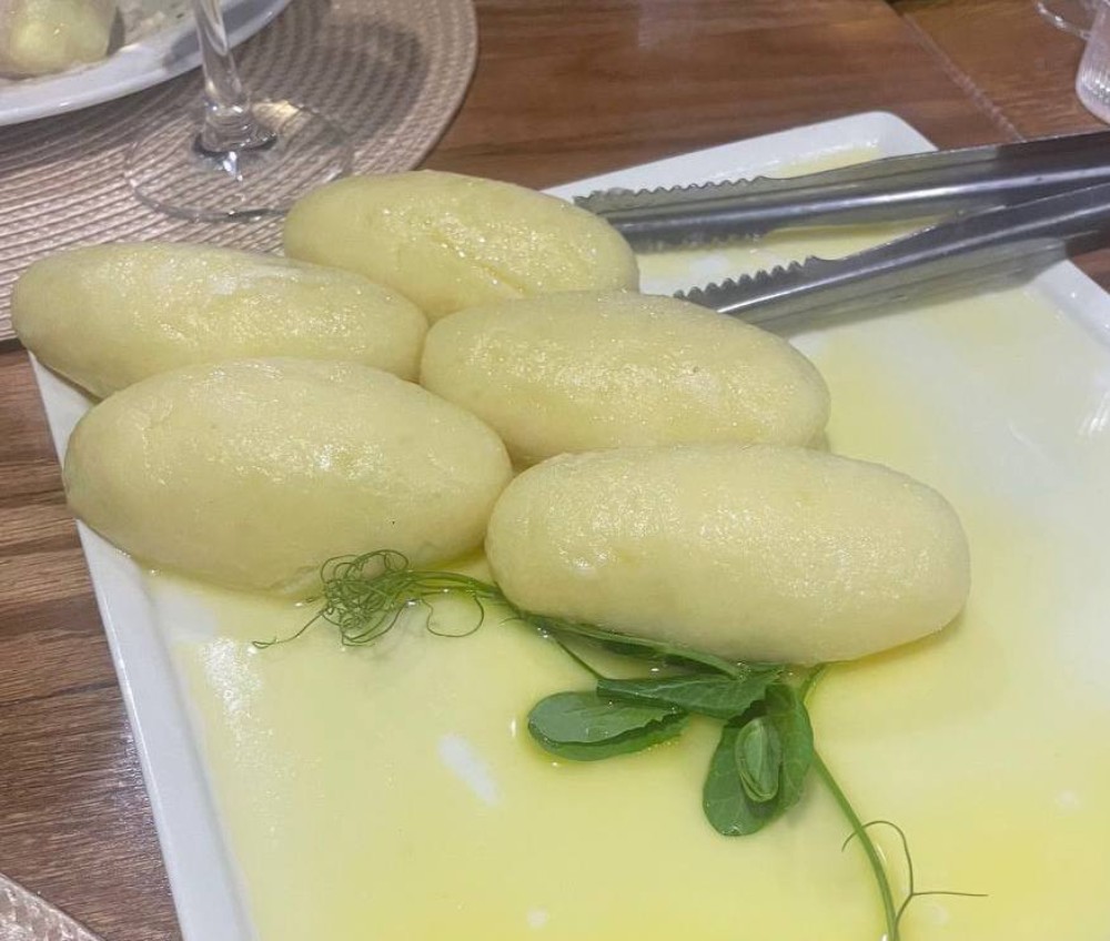 Книдлі з сиром під грибним соусом 