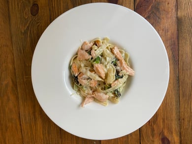 Pasta with salmon and broccoli in a creamy
